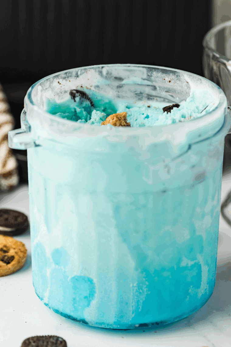 Bowl of Easy Ninja Creami Cookie Monster Ice Cream with cookie chunks