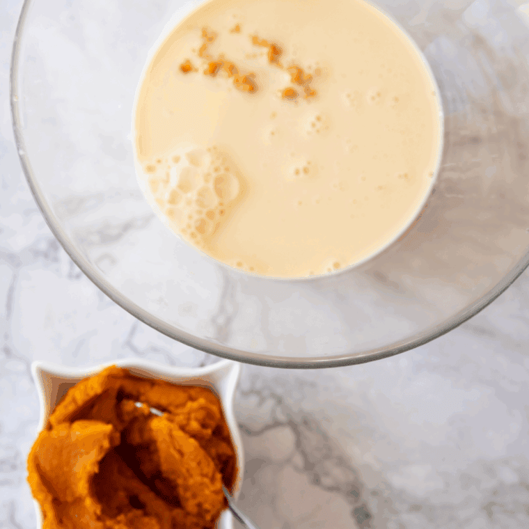 Pumpkin purée, cream cheese and spices whisked with cream and milk for the ice cream base.