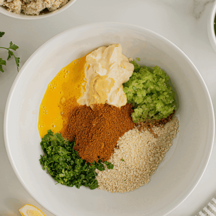 Add all of the ingredients for the tartar sauce in a small mixing bowl.