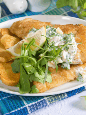 Crispy Long John Silver’s copycat fish with golden batter served with lemon wedges.