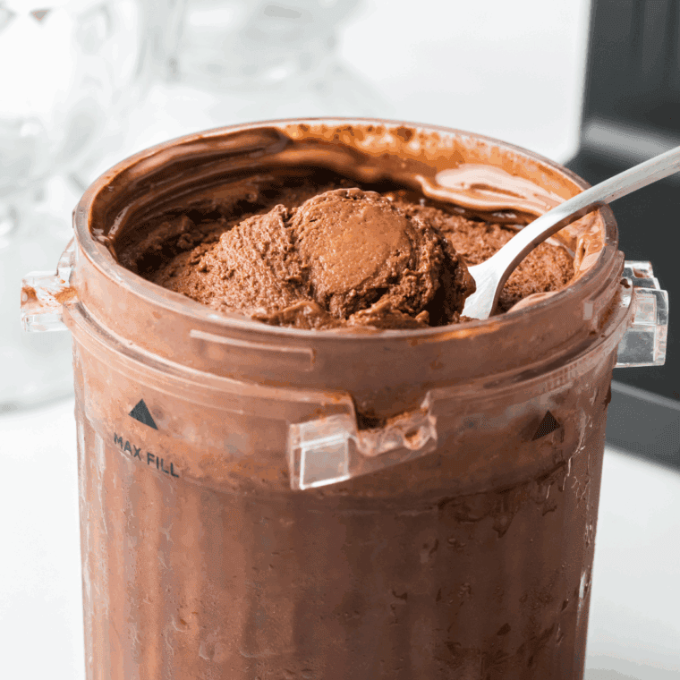 Bowl of Ninja Creami Blue Bell Dutch Chocolate ice cream with chocolate chunks.