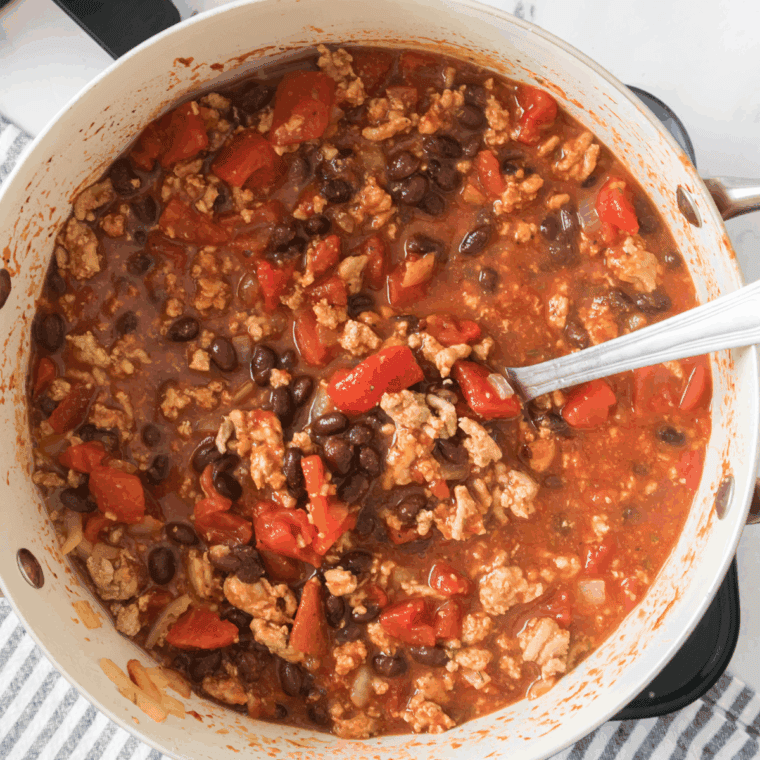 Mixing the ingredients in a saucepan, and mix until the cream cheese is melted.