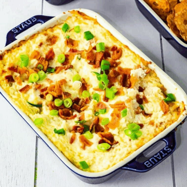 Serving chili cheese dip with tortilla chips in a bowl.