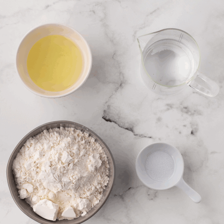 Ingredients needed for Easy Air Fryer Homemade Flour Tortillas on kitchen table.