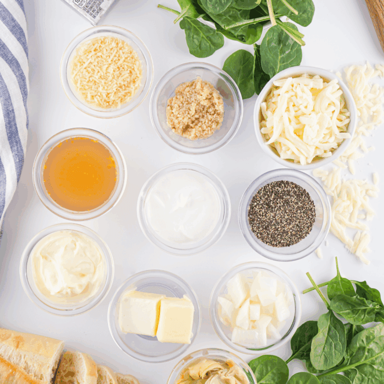 Ingredients needed for Easy Lipton Onion Soup Spinach Dip on kitchen table.