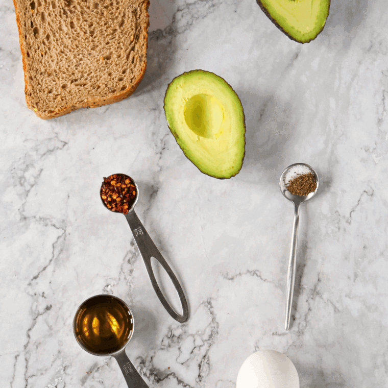 Ingredients needed for First Watch Avocado Toast Ingredients on kitchen table.