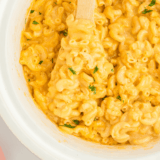 Creamy copycat Jason’s Deli mac and cheese in a skillet with golden breadcrumb topping