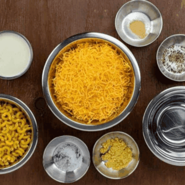 Ingredients needed for Easy Copycat Jason’s Deli Mac and Cheese Recipe on kitchen table.