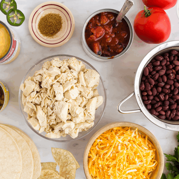 Ingredients needed for Easy Ina Garten's Mexican Chicken Casserole Recipe on kitchen table.