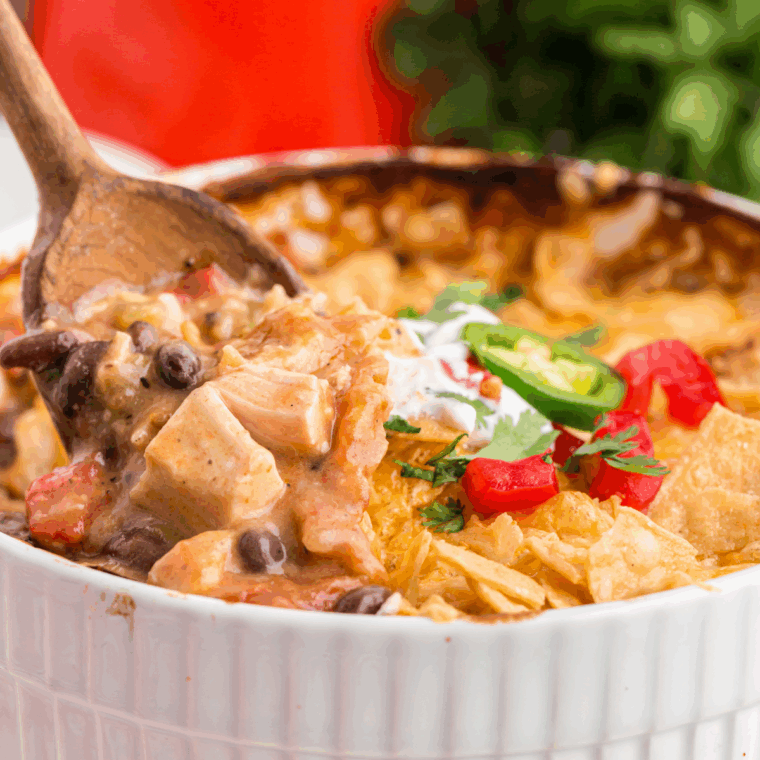 Ina Garten's Mexican Chicken Casserole, baked until golden and bubbly, topped with fresh cilantro.