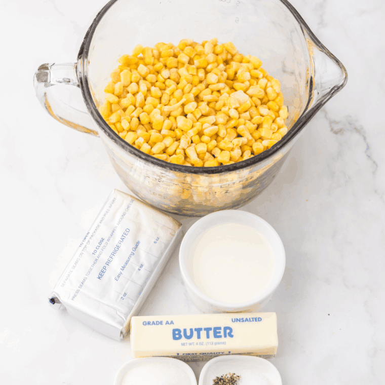 Ingredients needed for Slow Cooker Ruth's Chris Creamed Corn Recipe on kitchen table.