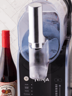 Ninja Slushi Machine on kitchen counter ready to make frozen slush drinks
