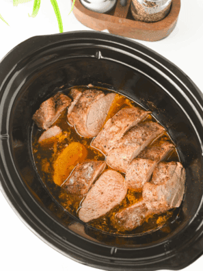 Slow cooker pork tenderloin cooked until tender and juicy