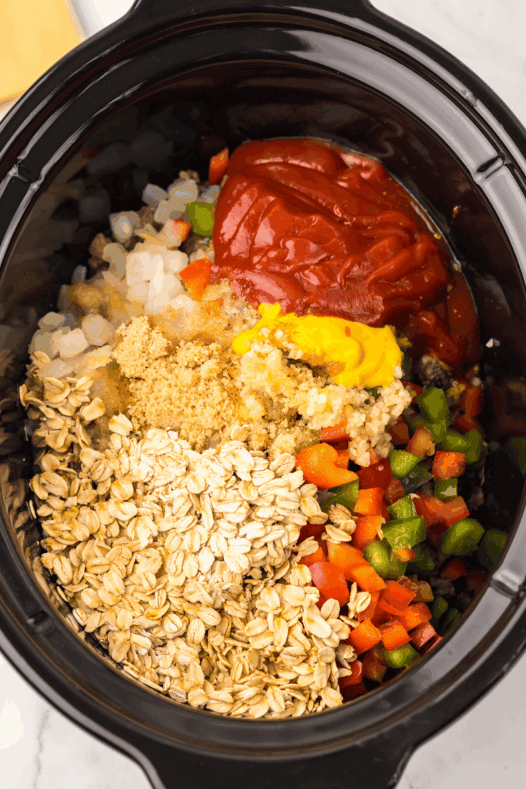 Whisking root beer, ketchup, brown sugar, Worcestershire sauce, mustard, and spices in a small bowl