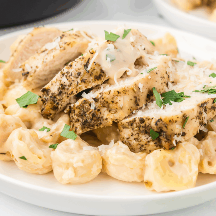 Extra-creamy Alfredo sauce in a pan, ready to serve over pasta