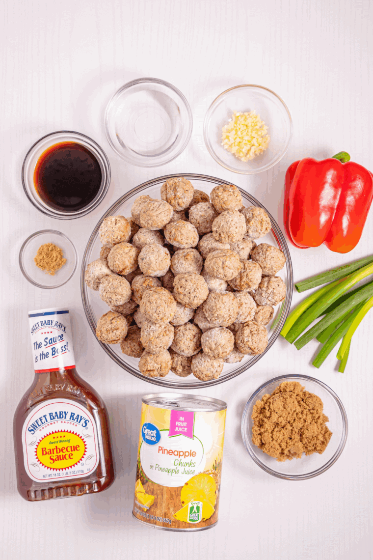 Ingredients needed for Crock Pot Hawaiian Meatballs on kitchen table.