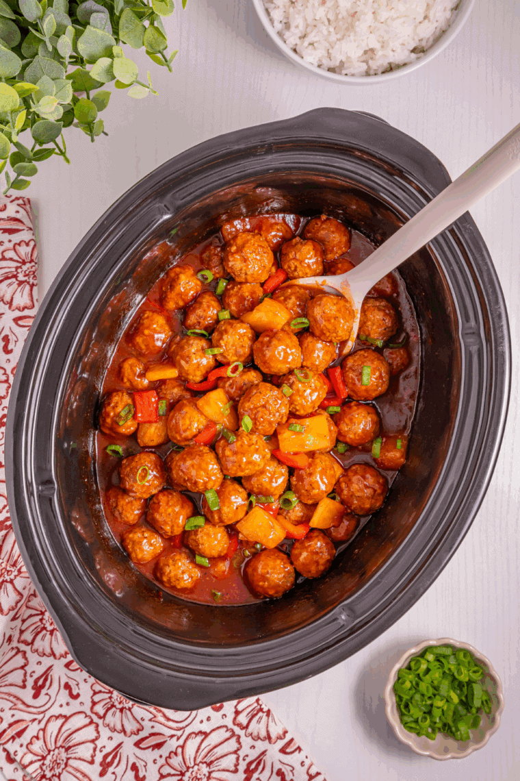 Crock pot Hawaiian meatballs in sweet pineapple sauce served warm