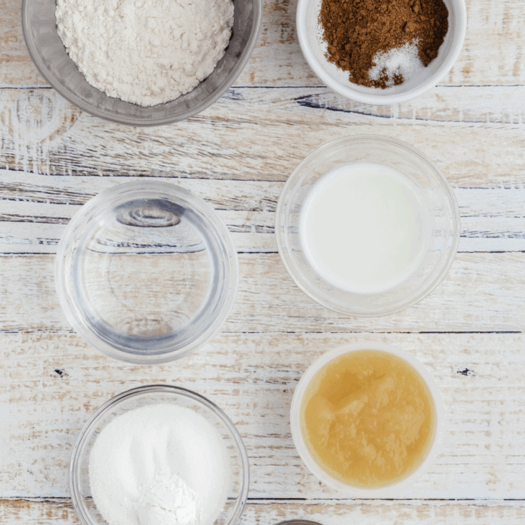 Ingredients needed for Easy Air Fryer Salted Caramel Apple Mug Cake on kitchen table.