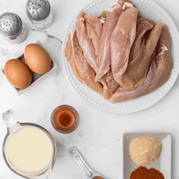 Ingredients needed for Easy Copycat Culver’s Chicken Tender Recipe on kitchen table.