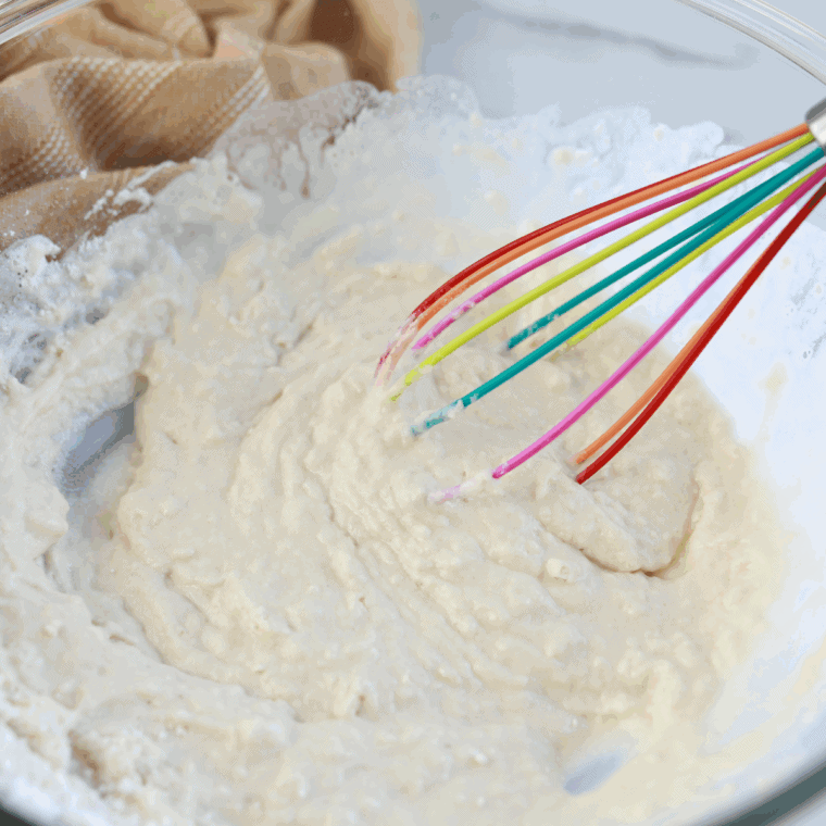 Mix flour, baking powder, salt, and sugar evenly in a large bowl.