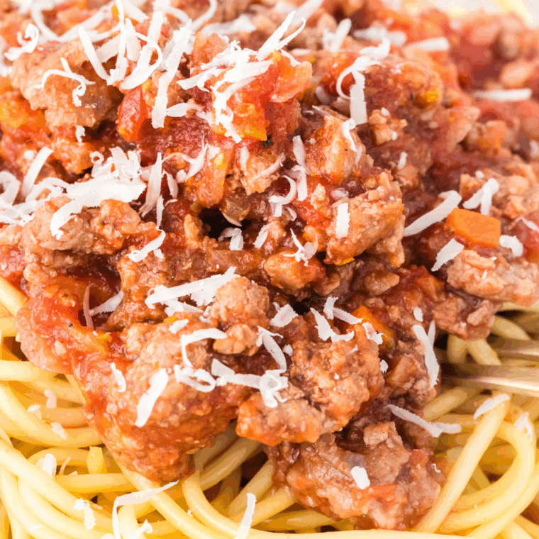 close up of Olive Garden bolognese sauce on pasta