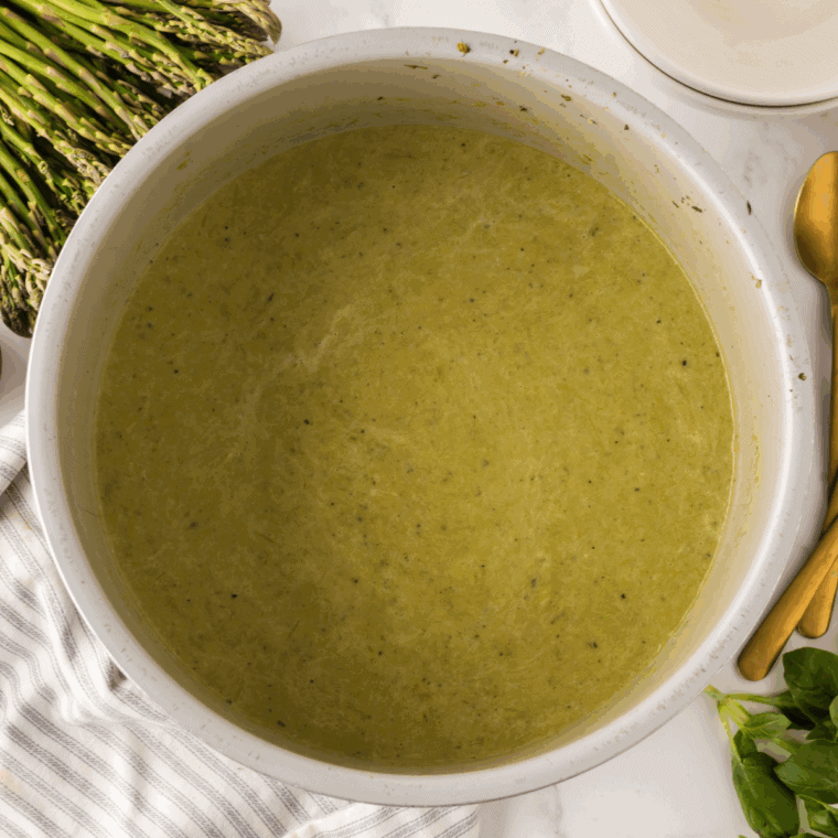 Close up of Ninja Foodi Cream of Asparagus Soup on kitchen table.