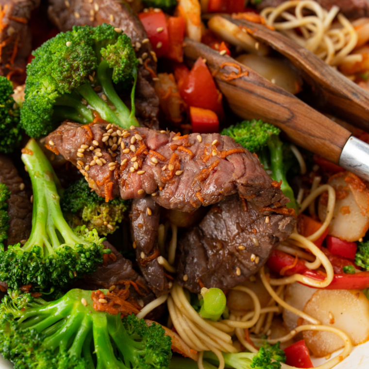 Air fryer beef lo mein with tender beef, vegetables, and noodles in a savory sauce