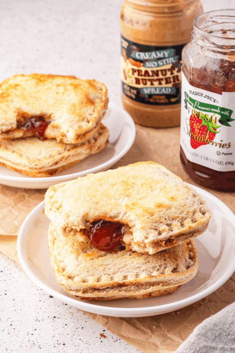 Air fryer DIY frozen Uncrustables with peanut butter and jelly filling