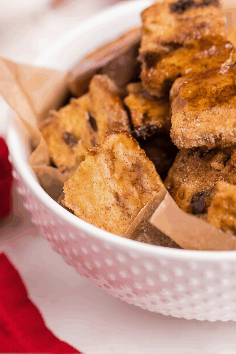 Air fryer French toast bites, golden and crispy, served with syrup