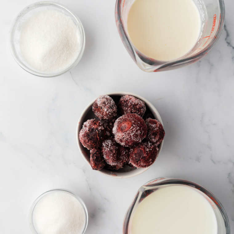 Ingredients needed for Easy Ninja Creami Cherry Gelato Recipe on kitchen table.