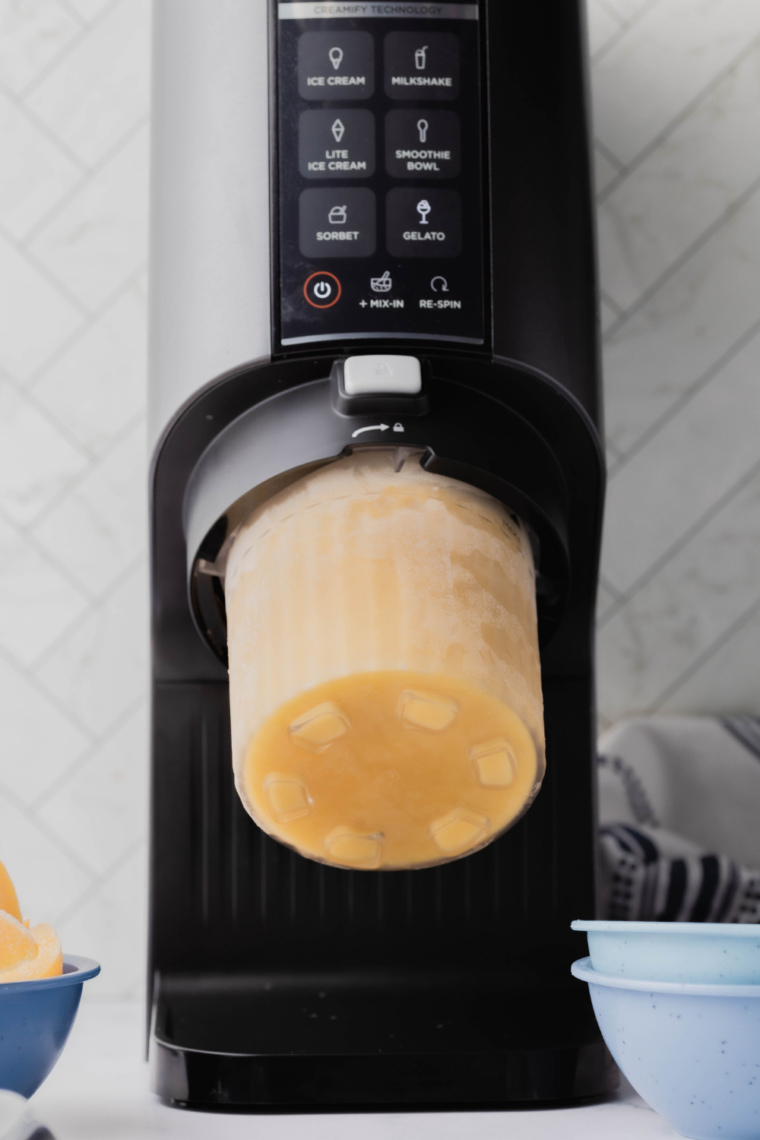 Frozen peach mixture processing on Gelato setting in Ninja Creami machine