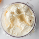 Creamy homemade Ninja Creami vanilla gelato scooped into a bowl with smooth texture.