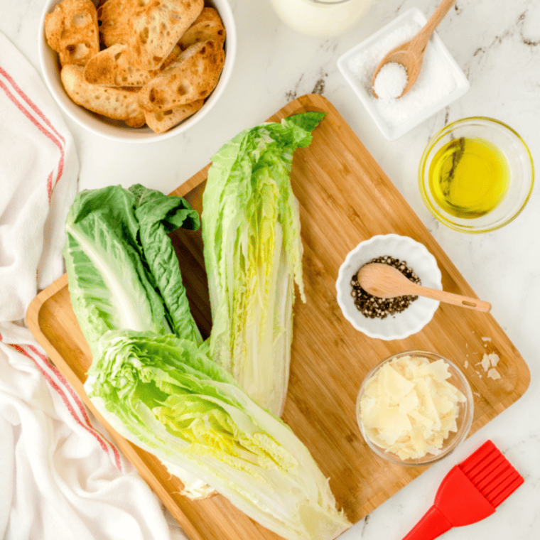 Ingredients needed for Copycat Bonefish House Salad on kitchen table.