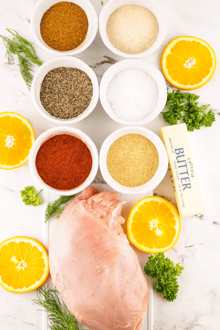 Ingredients needed for Copycat Tony Chachere’s Creole Seasoning on kitchen table.