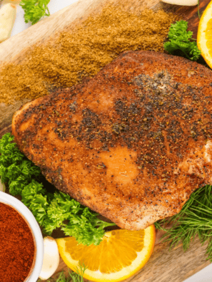Juicy Cajun Smoked Turkey Breast sliced and served on a platter.