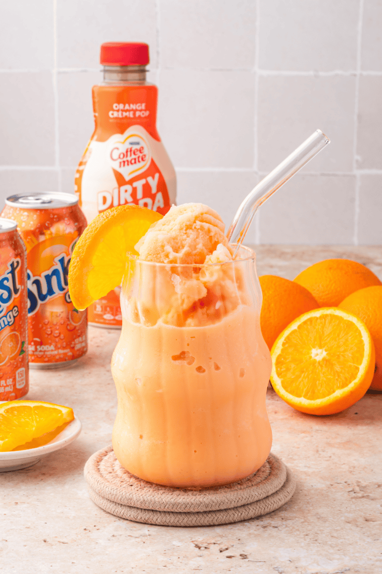 Make a fun and refreshing Easy Ninja Slushi Frozen Dirty Orange Soda at home! Icy, fizzy, and sweet, this orange slush is perfect for kids, parties, or a hot summer day.