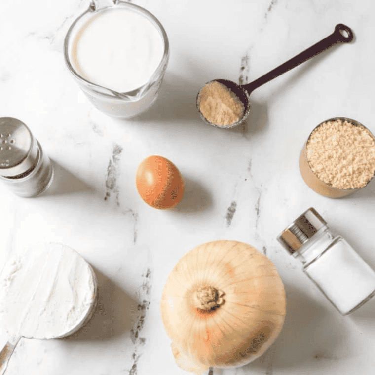 Ingredients needed for Long John Silver’s Onion Rings Recipe on kitchen table.
