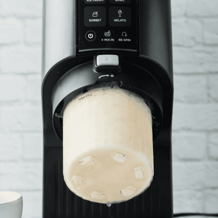 Process in the Ninja Creami: Placing pint in Ninja Creami and using Gelato function to create creamy gelato.