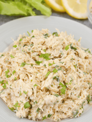 Creamy chicken salad made with shredded chicken and mayo served in a bowl, inspired by Chicken Salad Chick Classic Carol.