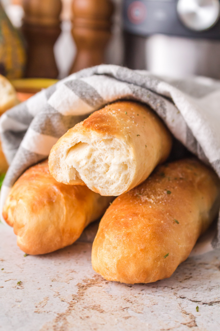 Homemade Fazoli’s copycat breadsticks brushed with garlic butter, baked until soft, fluffy, and golden brown.