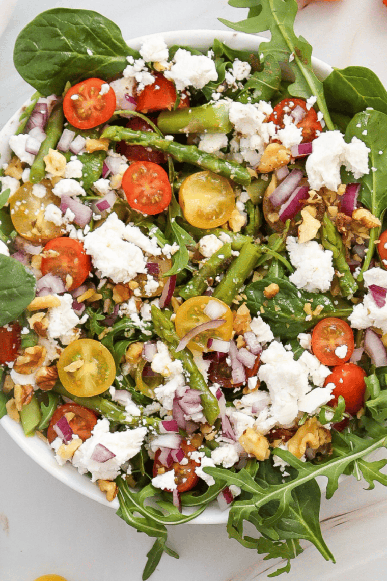 Creamy buttermilk ranch dressing in a bowl made with fresh herbs and spices, served as a dip for vegetables and a dressing for salads.