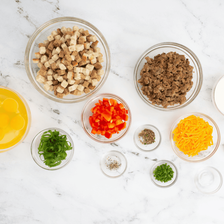 Ingredients needed for Easy Ina Garten’s Breakfast Strata Recipe on kitchen table.