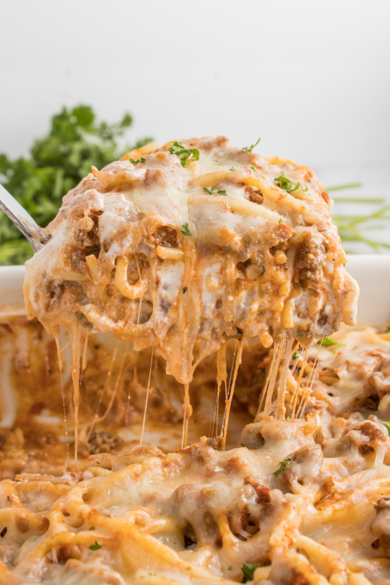 Baked spaghetti casserole with marinara sauce and melted cheese, inspired by Fazoli’s copycat recipe, served hot from the oven.