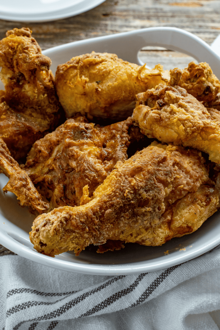 Crispy Gordon Ramsay buttermilk fried chicken on a plate with golden crunchy coating and juicy interior served hot and fresh.