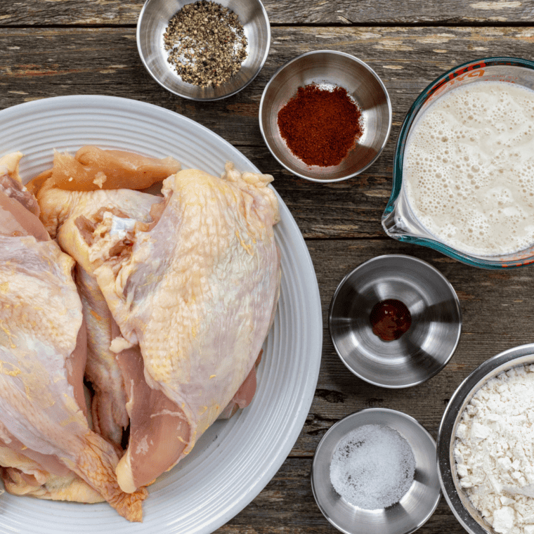 Ingredients needed for Gordon Ramsay’s Buttermilk Fried Chicken on kitchen table.