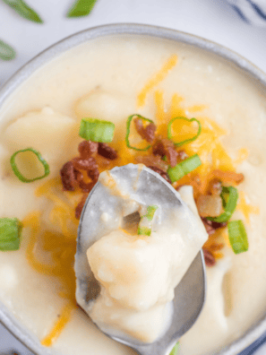 Creamy McAlister’s-style potato soup in a bowl topped with cheese, bacon, and green onions, rich and hearty loaded potato soup copycat recipe.