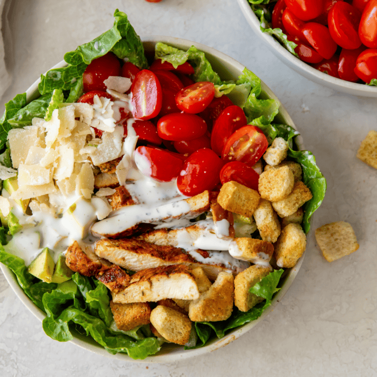 Creamy homemade ranch dressing served in a bowl with fresh herbs, perfect for dipping fries, vegetables, and chicken wings