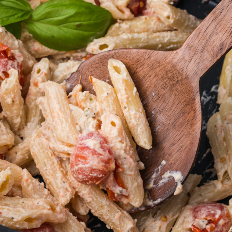 one dish air fryer pasta with melted Boursin cheese and tomatoes