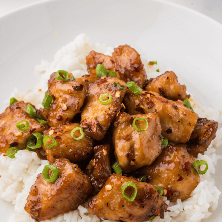 Crispy chicken bites coated in homemade hot honey sauce.