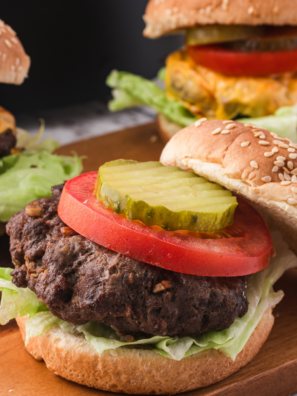 Homemade McDonald’s hamburger on sesame seed bun with pickles and ketchup